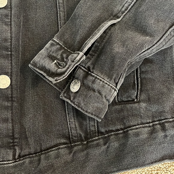 Worn 1 time. Distressed black denim jean jacket. Runs generous. - Picture 7 of 7